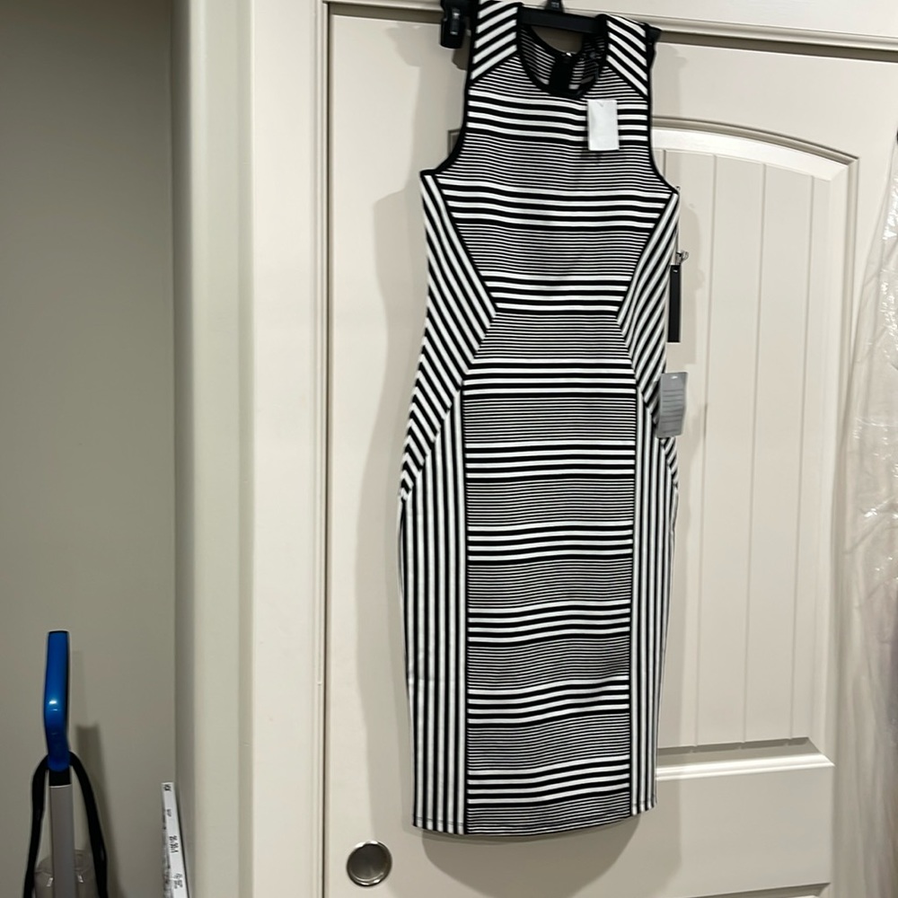Felicity and Coco dress never worn still with the tags.